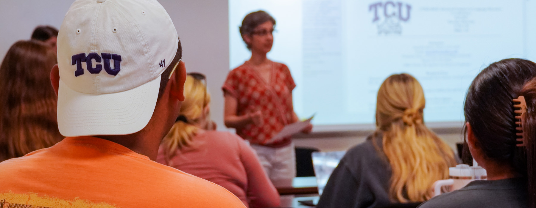 Students in classroom listening to lecture